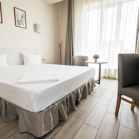 Номер первой категории (двухместный) 1 большая кровать или 2 раздельные кровати